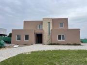 Casa en Venta al Golf y Laguna Haras Santa Maria Atardecer