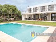 CASA EN VENTA EN COSTA ESMERALDA BARRIO ECUESTRE 7 AMBIENTES