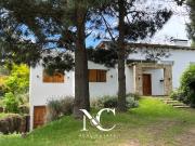 Casa en venta en Costa Esmeralda con fondo libre arbolado