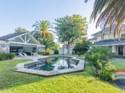 CASA EN VENTA EN GONNET 4 DORMITORIOS QUINCHO