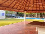Casa en Venta en Jardines de Mayakoba – 2 Recámaras,...