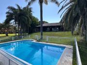 Casa exclusiva con bajada al río en Country Ubajay