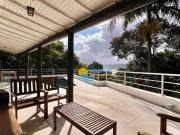 Casa frente mar com sacada — Enseada — Guarujá