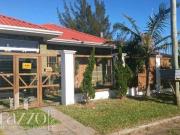 Casa geminada com 3 dormitórios em Nova Tramandaí