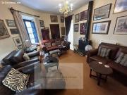 Casa Histórica con 5 Dormitorios y Patio en Plaza Mondragón