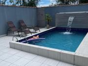 Casa lado praia, no Jardim das Palmeiras em Itanhaém