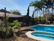 Casa lado serra, no Boungainville IV em Peruibe