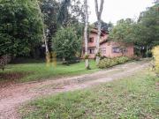 Casa no perfil de chácara no Bairro Campo Comprido, com...