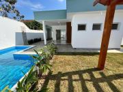 CASA NOVA COM PISCINA LADO PRAIA