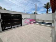 CASA NOVA COM PISCINA LADO PRAIA EM RUA PAVIMENTADA