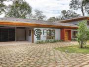 Casa nova e moderna com 5 suítes 1 master Condomínio...