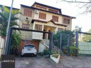 Casa / Sobrado para Venda em Porto Alegre/RS Três...