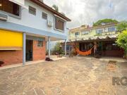 Casa / Sobrado para Venda em Porto Alegre/RS Três...