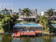 Casa sobre lote a la laguna en alquiler anual con...