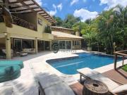 Casa sofisticada pé na água e com vista para o pôr do...