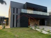 Casa térrea com 460 m² Condomínio Alphaville IV 05 suítes