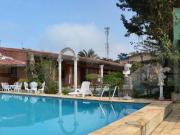 Casa térrea, com estilo neoclássico no Guarujá