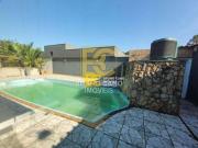 Casa térrea com piscina em condomínio Residencial São...