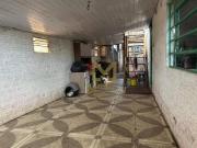 Casas geminadas em terreno plano de 10x30m