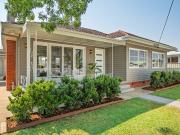 Central Convenience with Charming Cottage Appeal