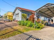 Central Location Home Dual Income Potential