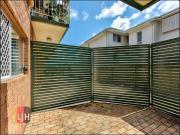 CENTRALLY LOCATED, 3 BEDROOM UNIT WITH A/C!