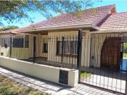 CHALET 4 AMB GARAGE PASANTE JARDIN Y PARQUE ATRAS