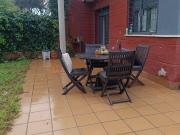 Chalet adosado con gran jardín