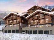 Appartement duplex dans un chalet neuf au pied des...