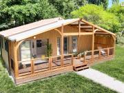 Chalet bois et parcelle en pleine propriété au bord d’un...