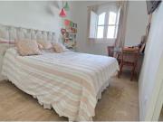 Chalet pareado, con jardín, piscina comunitaria y...