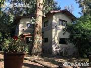 Chalet rústico en dos plantas