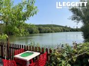 Chalet/bungalow avec étang de pêche sur un terrain de...
