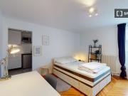 Chambre dans un appartement partagé de 14 chambres à...