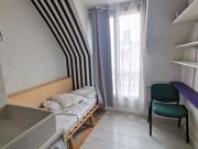 Chambre de bonne occupée Quartier Maison Blanche