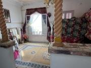 Chambre et salon à louer dans un appartement