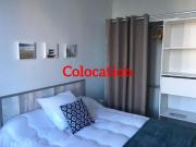 Chambre meublée en colocation
