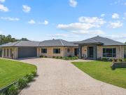 DON'T BE FOOLED. This is Low maintenance acreage living