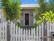 CHARACTER FILLED COTTAGE IN PRIME TOWN POSITION