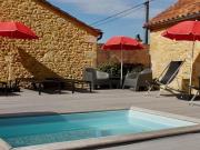 Charmant ensemble de trois maisons anciennes en pierre...