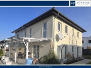 Charmante Doppelhaushälfte in zentraler Siedlungslage