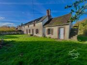 Charmante fermette dotée d'un hangar sur un terrain...