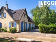 Charmante maison dans un cadre boisé paisible