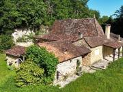 Charmante maison en pierre, garage et dépendances sur...