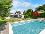 Exklusives Einfamilienhaus mit Aussenpool und grossem Garten