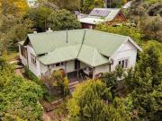 Charming 1910s Cottage with Studio and Walk to Town...