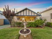 Charming 1930s Cottage with Modern Comforts on a Green...