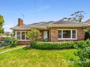 Charming Brick Home in prized location