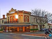 Charming City Fringe Living