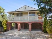 Charming Coastal Retreat With Space and Potential